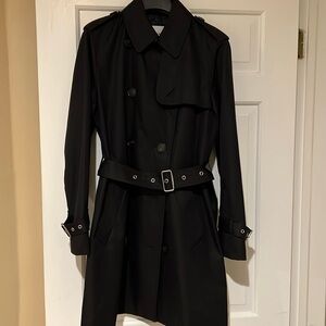 Women’s Coach black Mid length trench-coat. Size medium